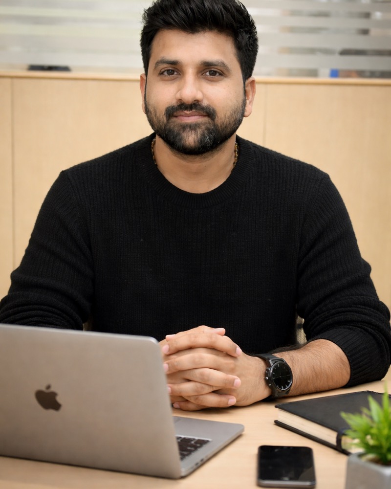 Rohan Surve, the founder of PrepMint, at his desk.